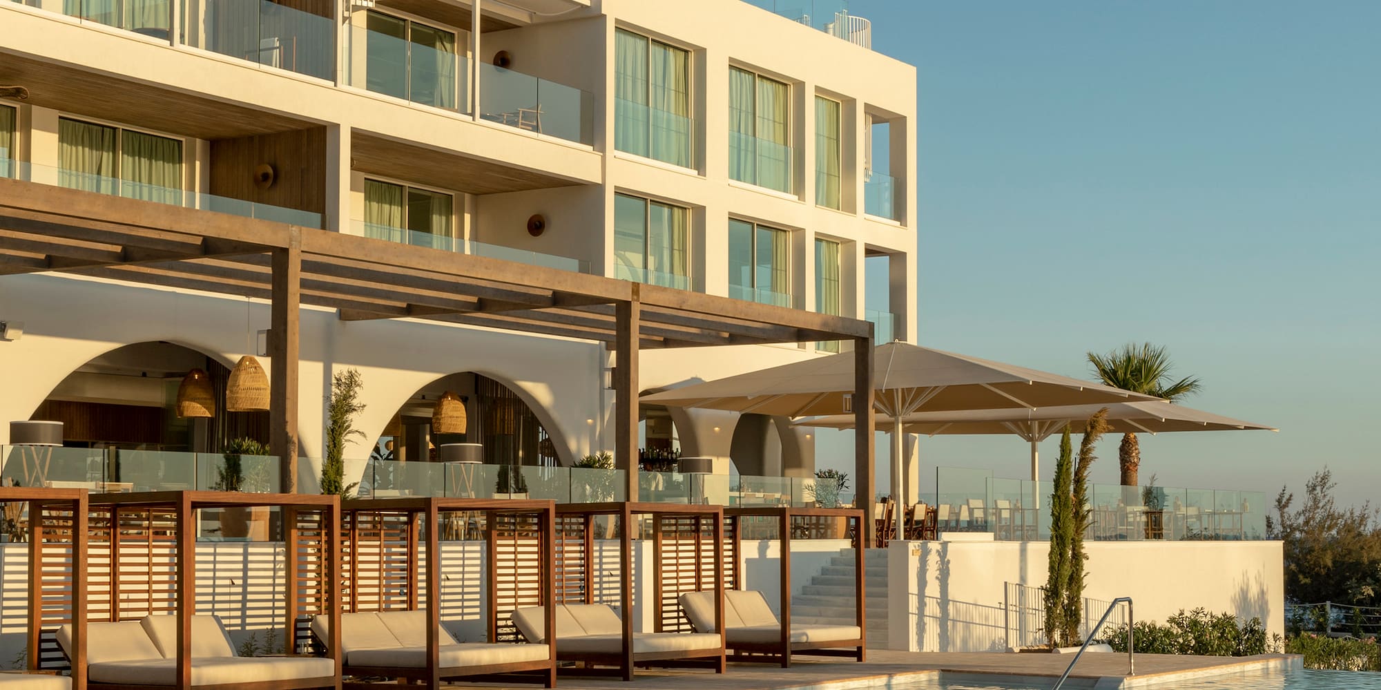 a pool with a building in the background