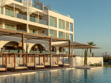 a pool with a building in the background