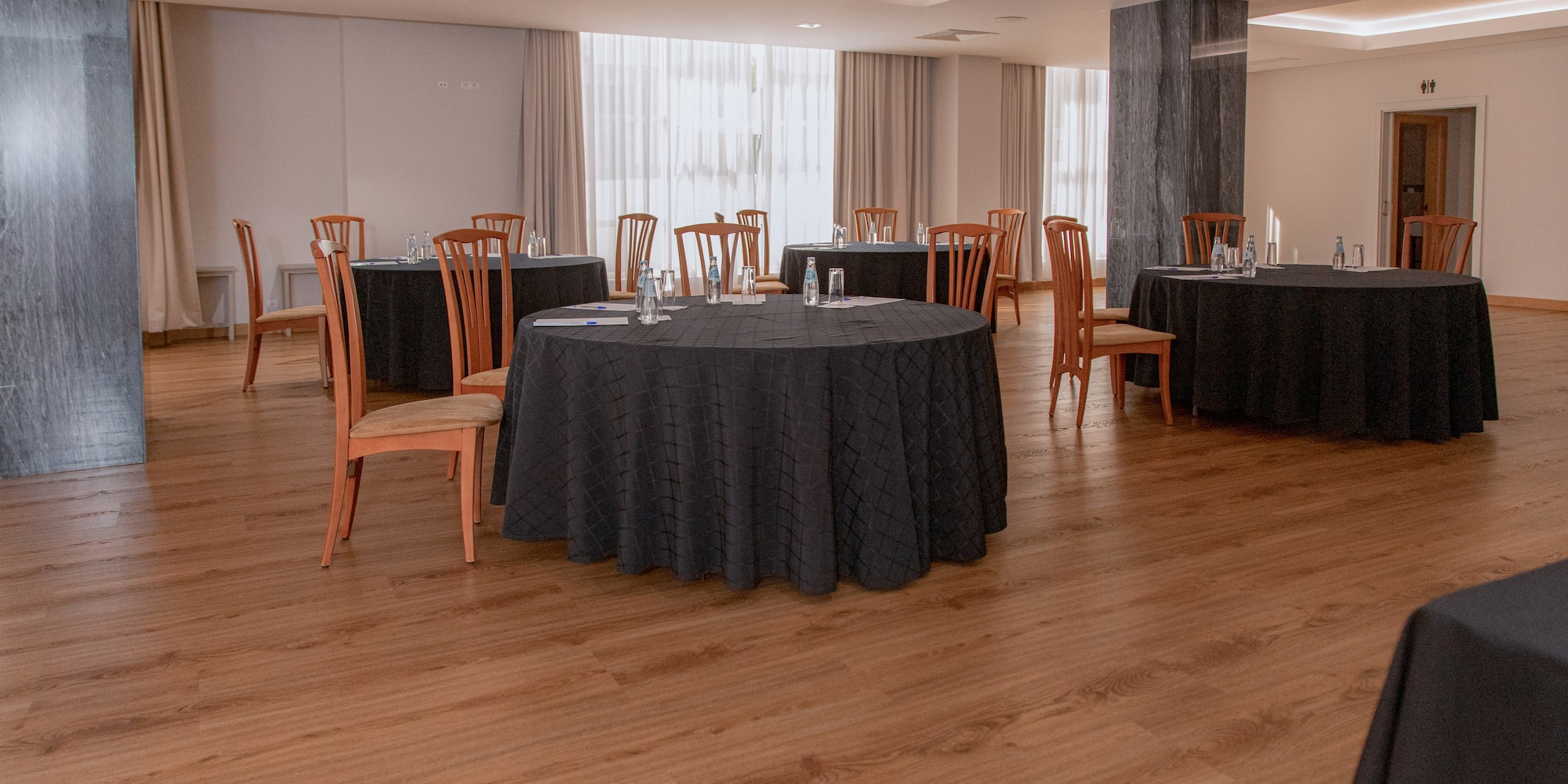 a room with tables and chairs