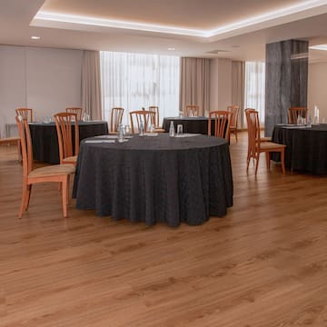 a room with tables and chairs