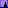 a person standing in front of a purple lit up wall