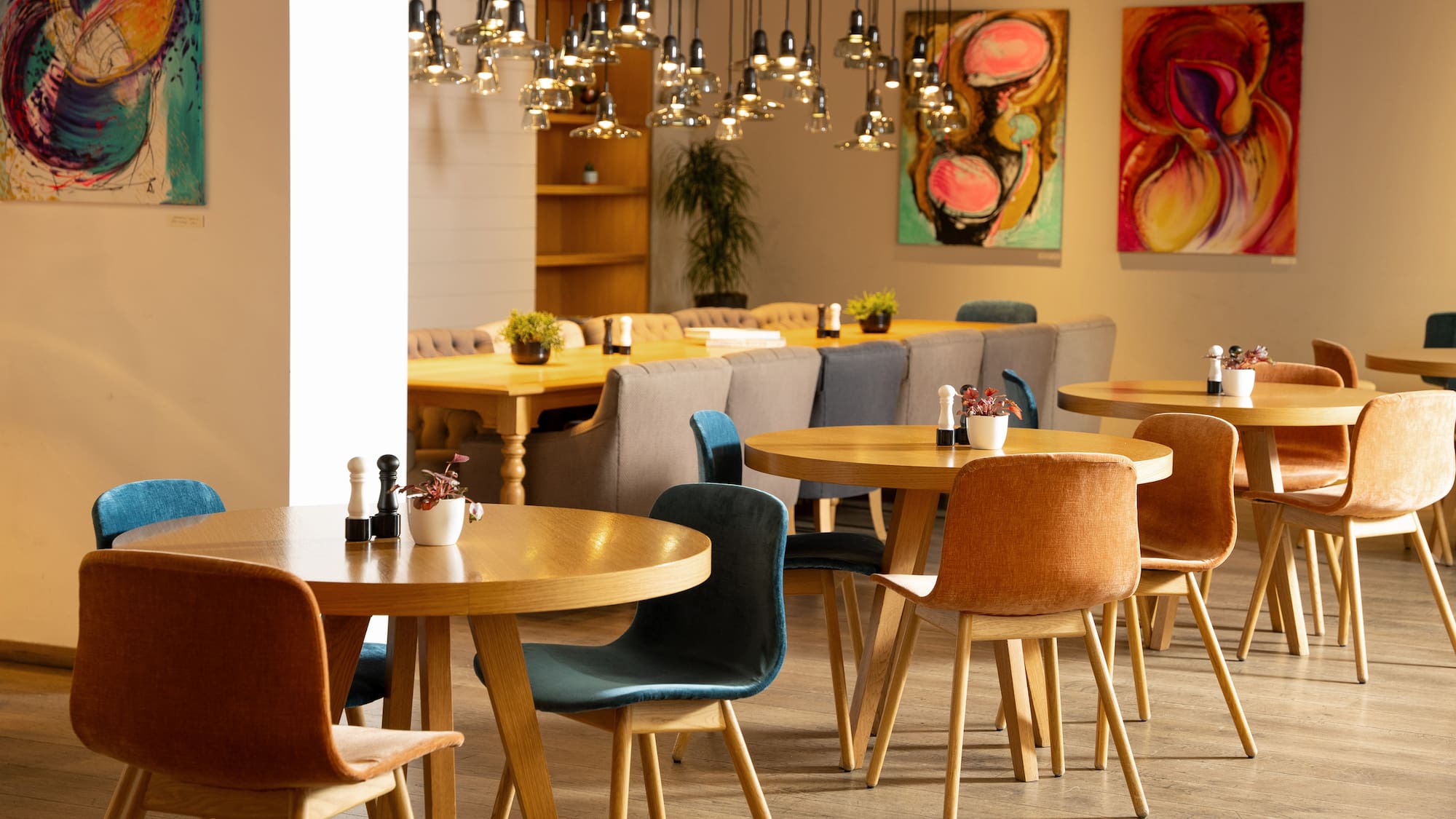 a room with tables and chairs