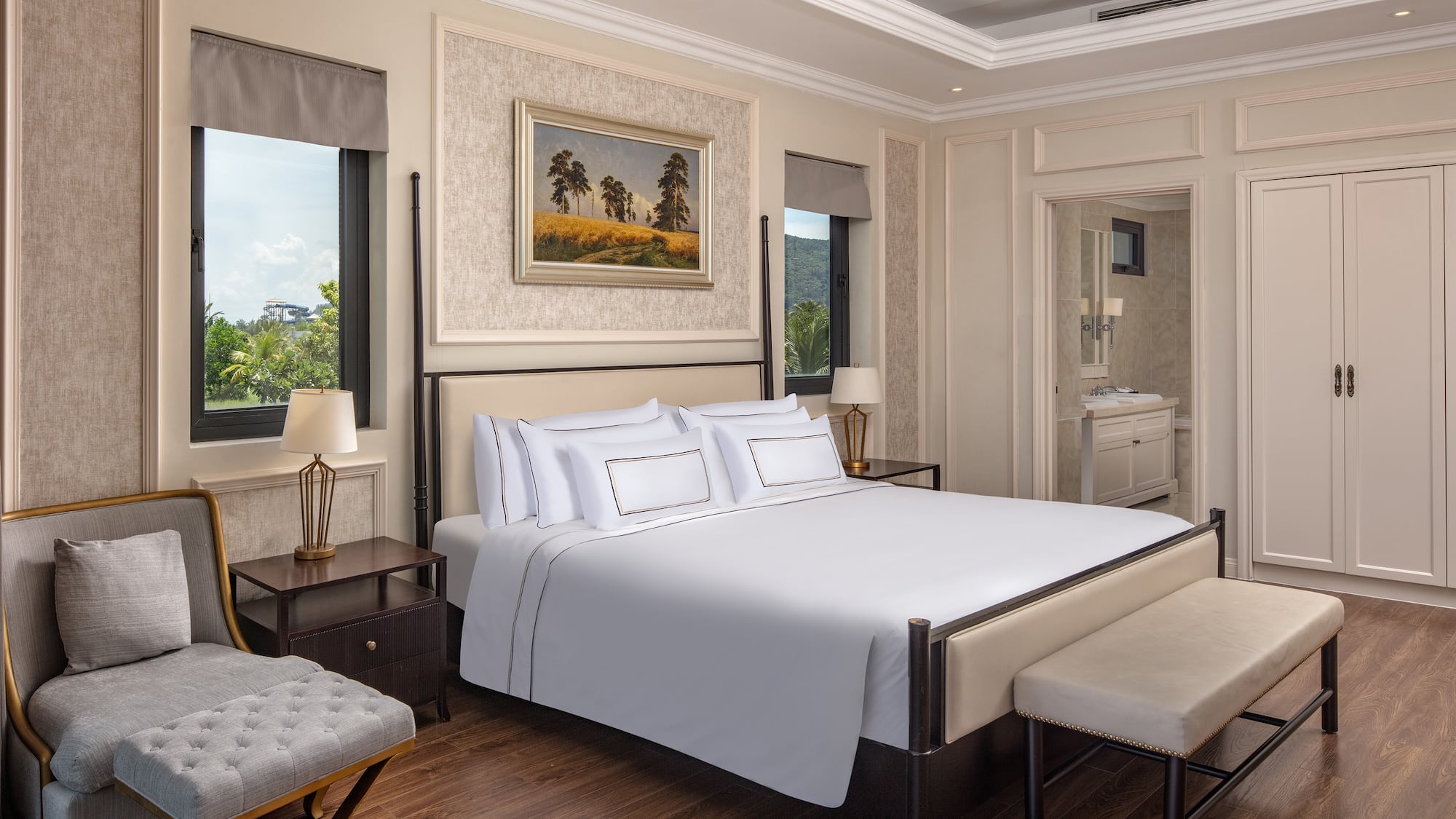 a bedroom with a bed and a bench