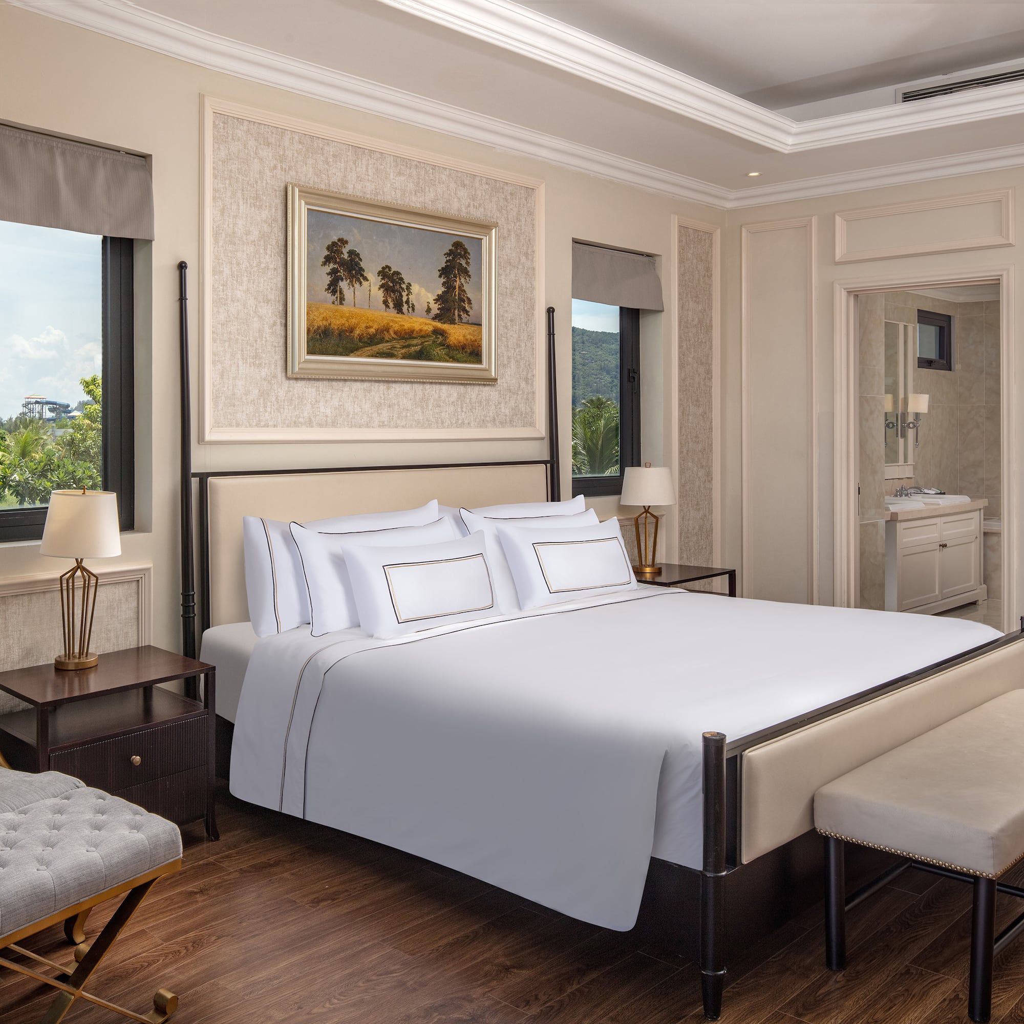 a bedroom with a bed and a bench