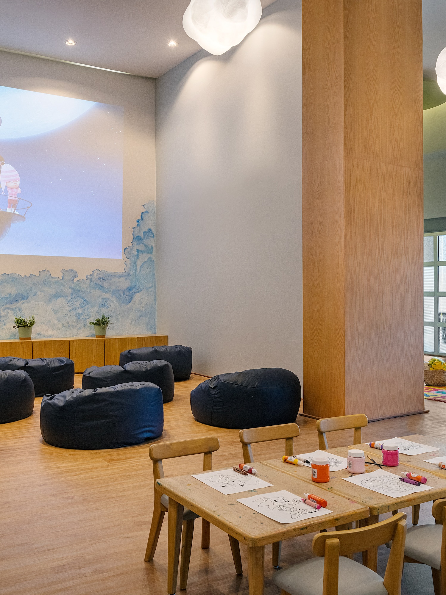 a room with a large projector screen