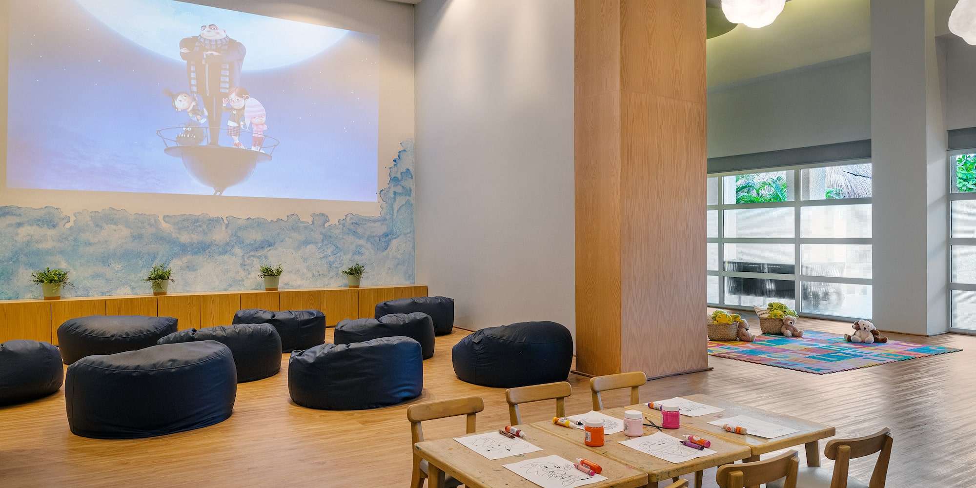 a room with a large projector screen