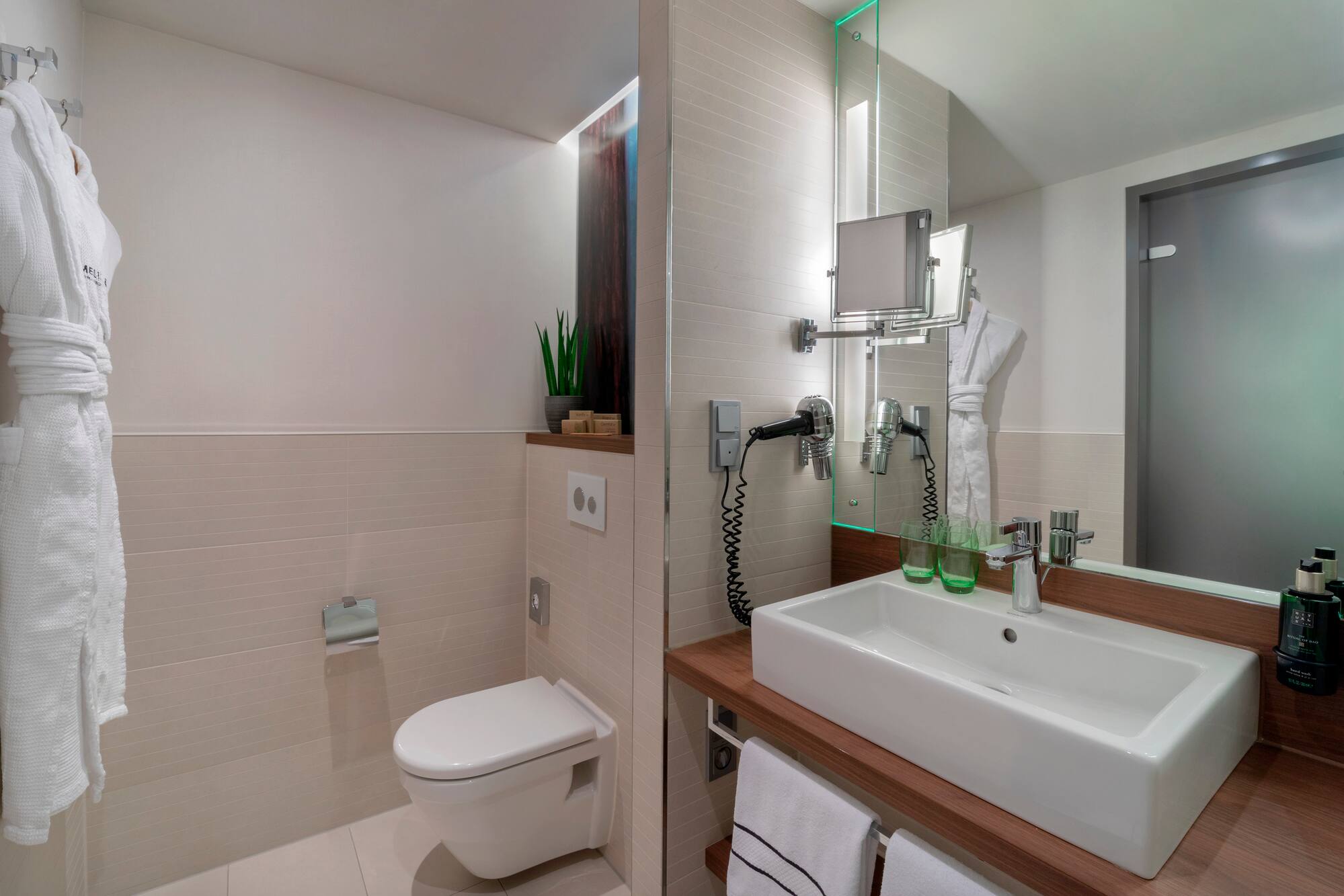 a bathroom with a sink and toilet