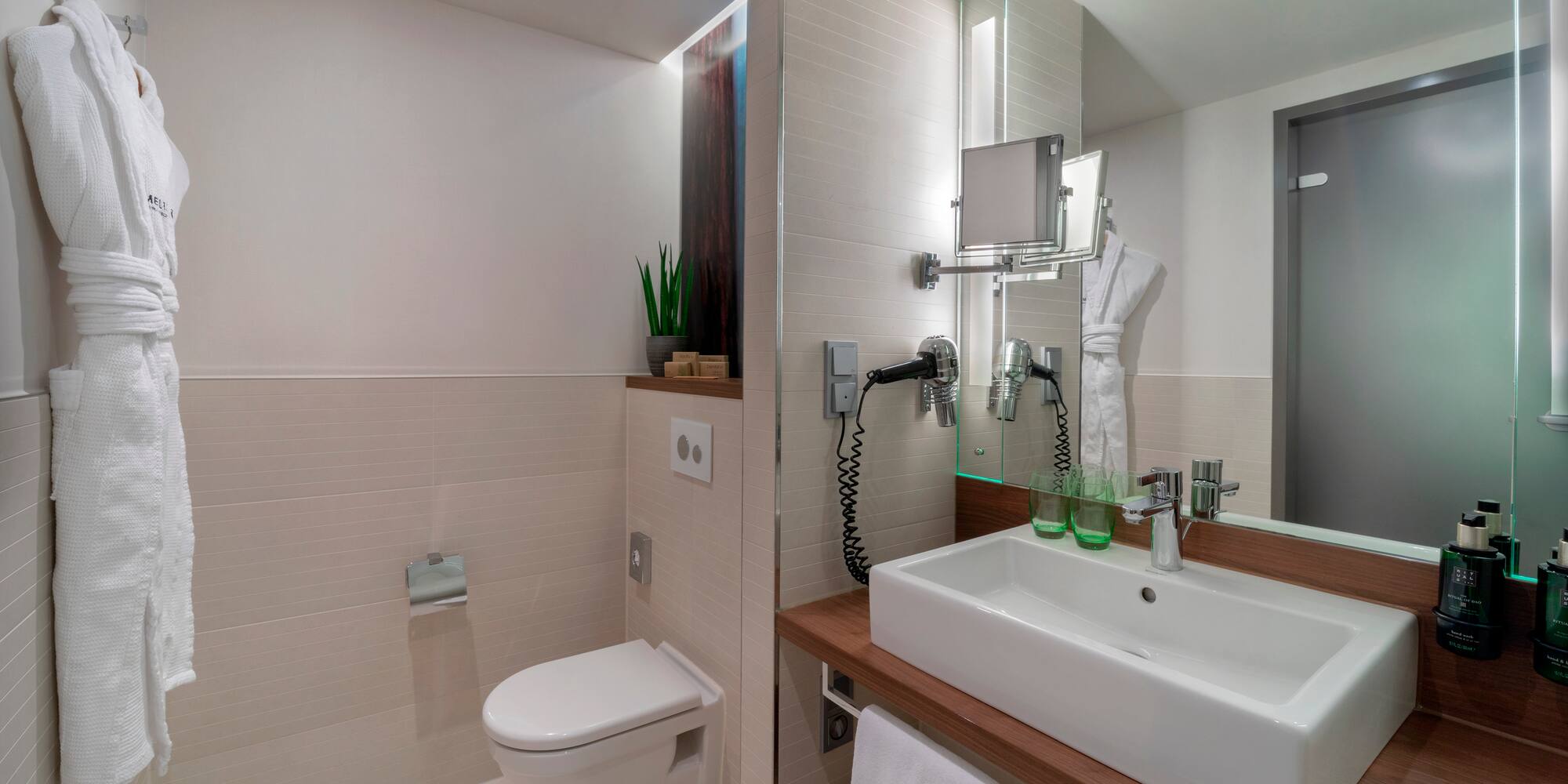 a bathroom with a sink and toilet