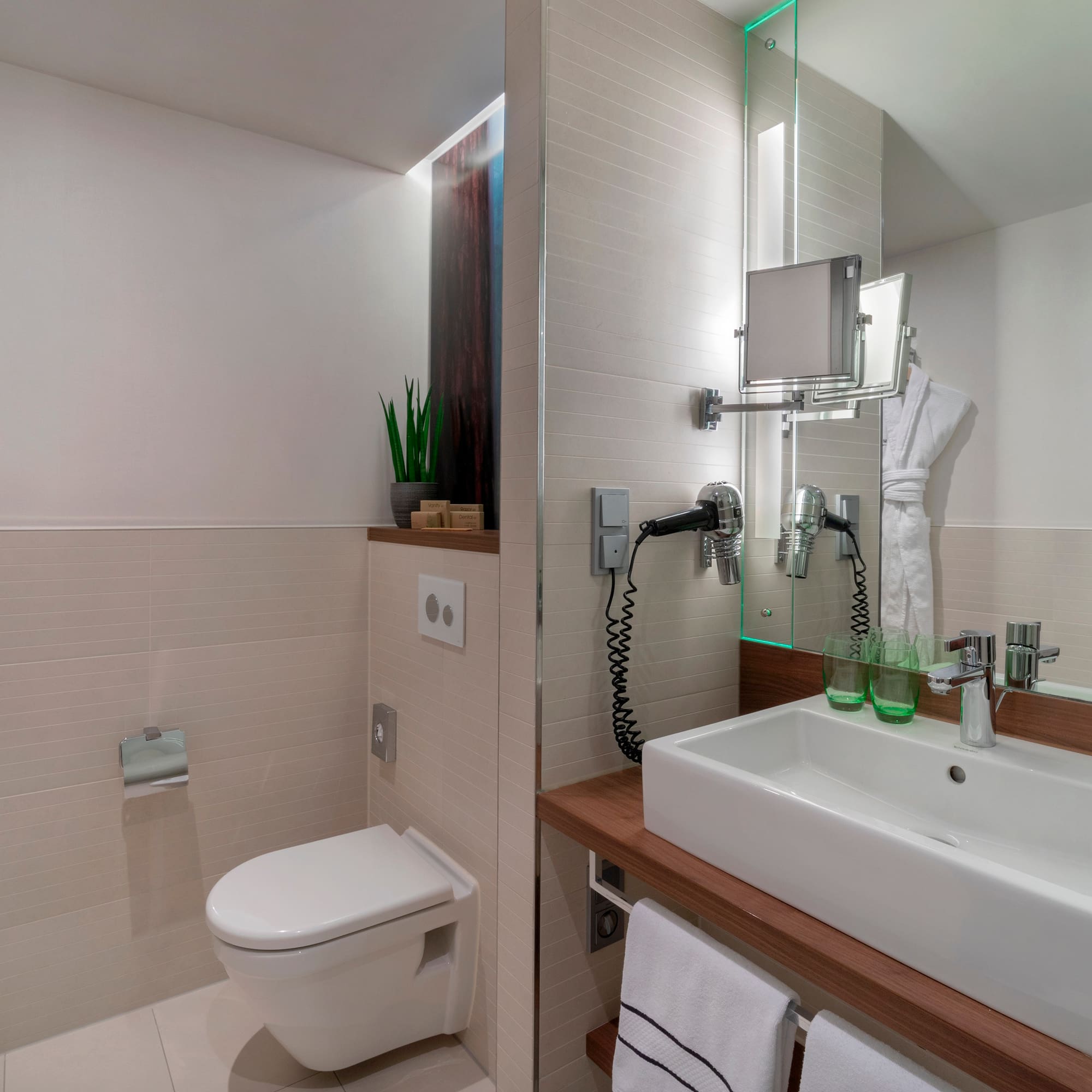 a bathroom with a sink and toilet