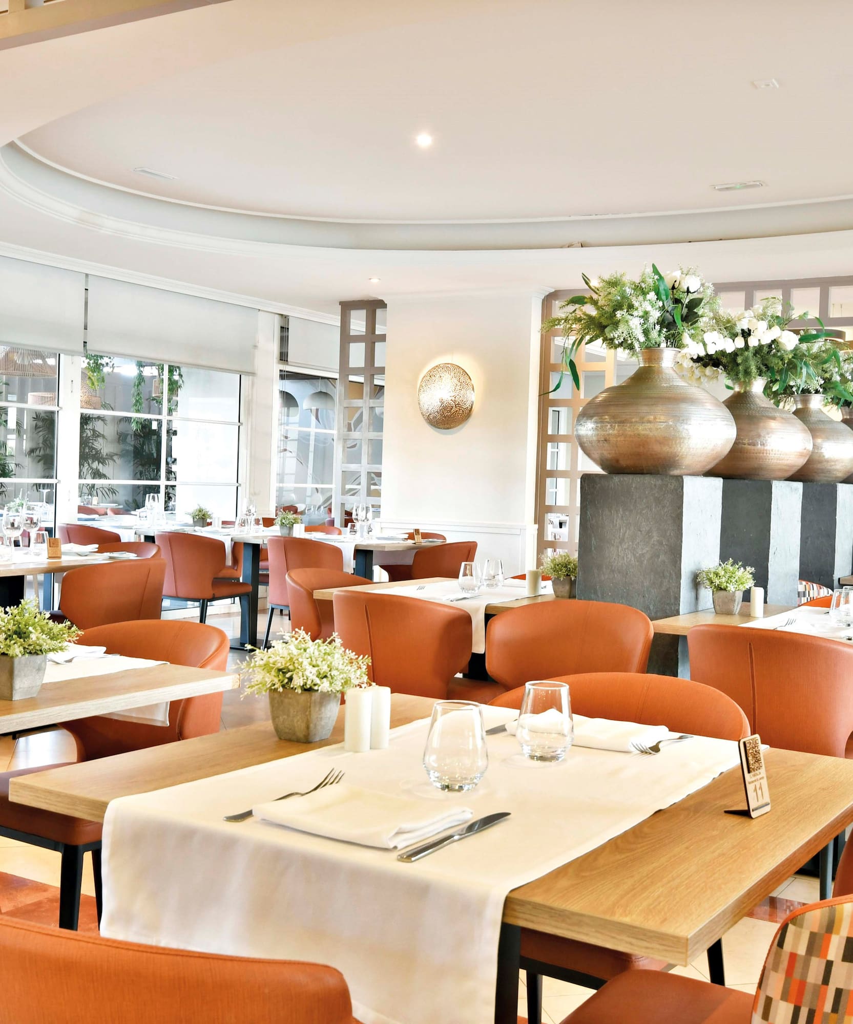 a room with tables and chairs