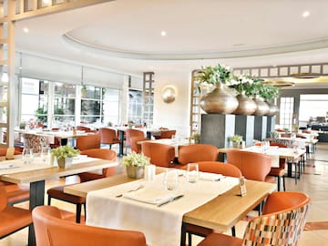 a room with tables and chairs