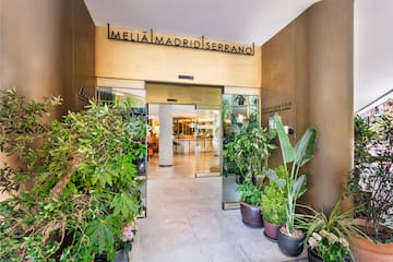 a entrance to a building with plants