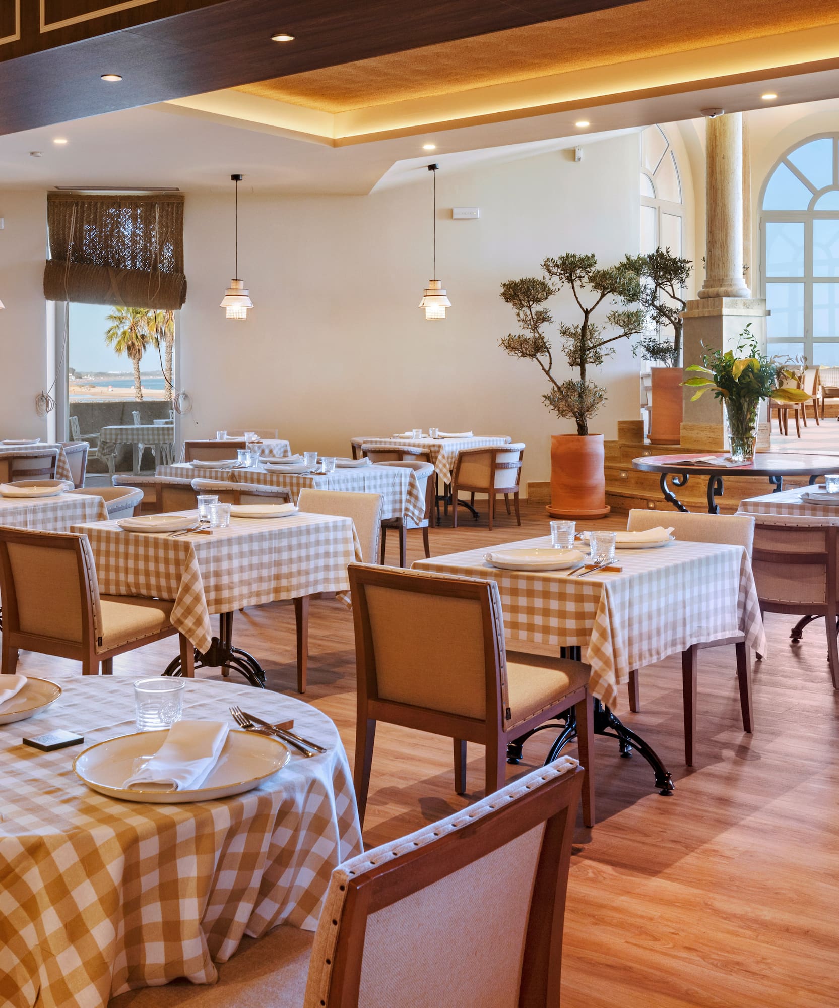 a restaurant with tables and chairs