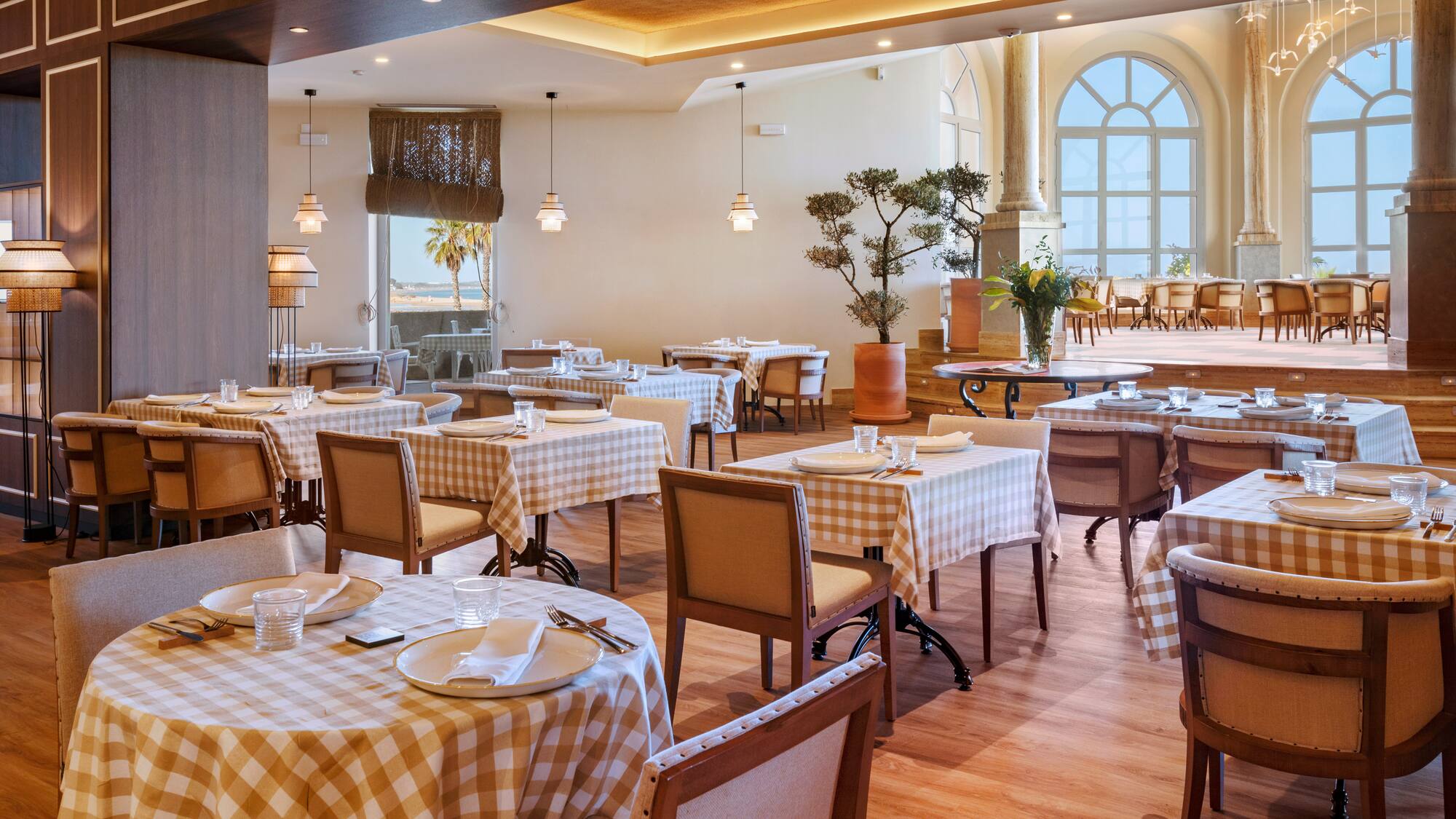 a restaurant with tables and chairs