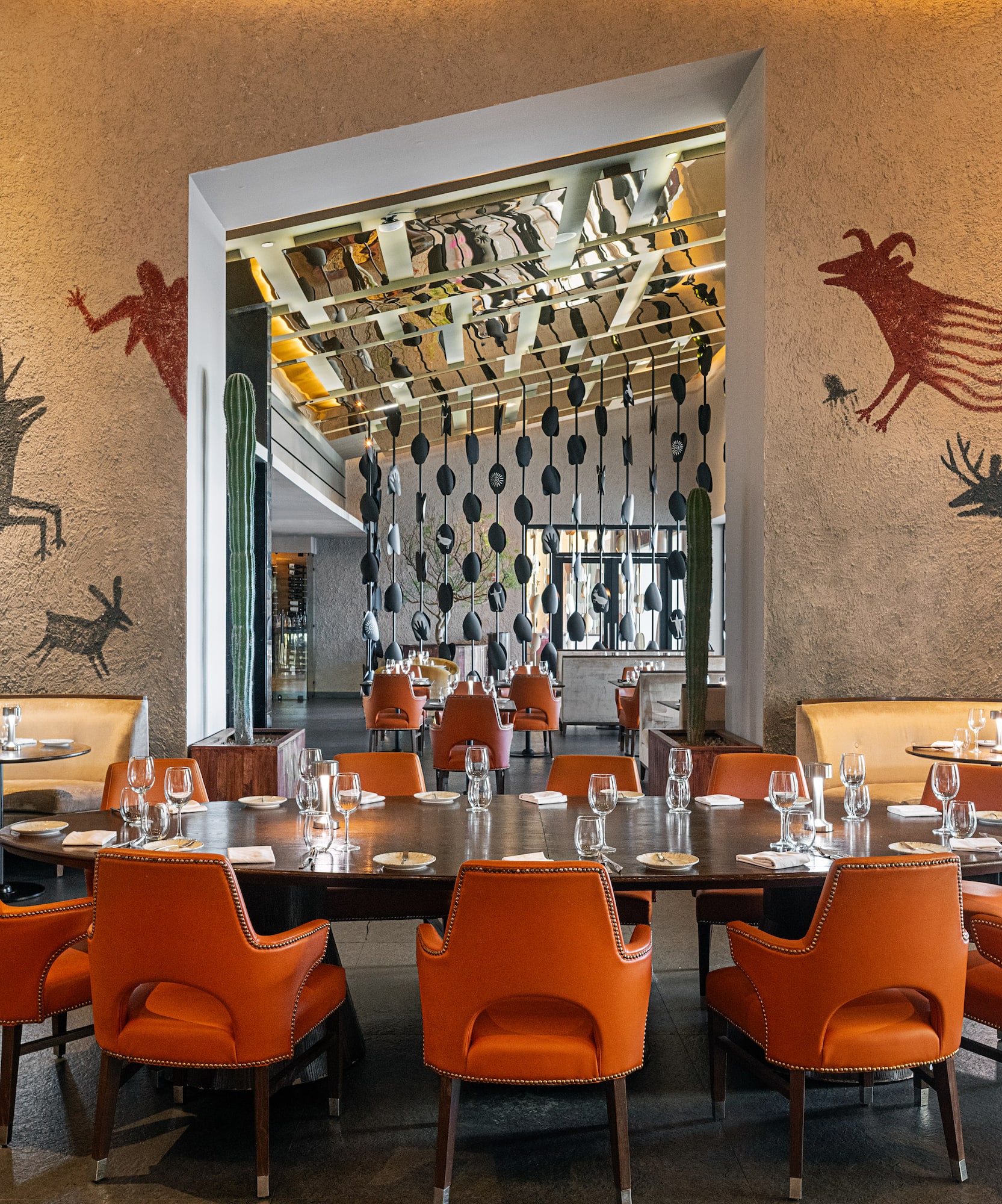 a room with a table and chairs