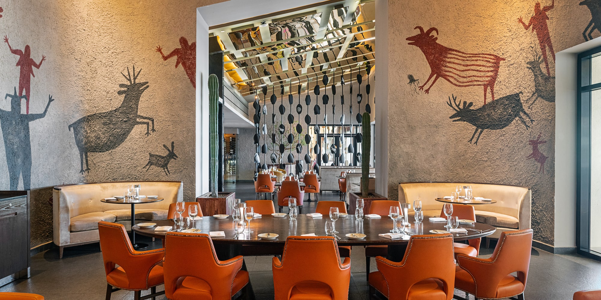 a room with a table and chairs