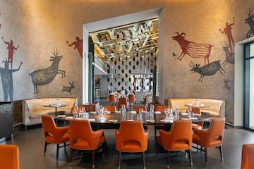 a room with a table and chairs