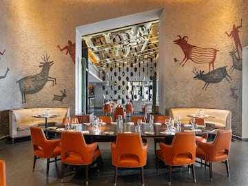 a room with a table and chairs