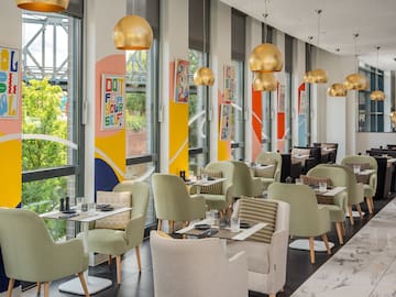 a room with tables and chairs