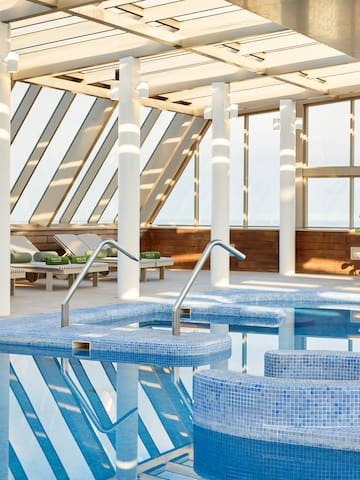 a pool with a glass roof