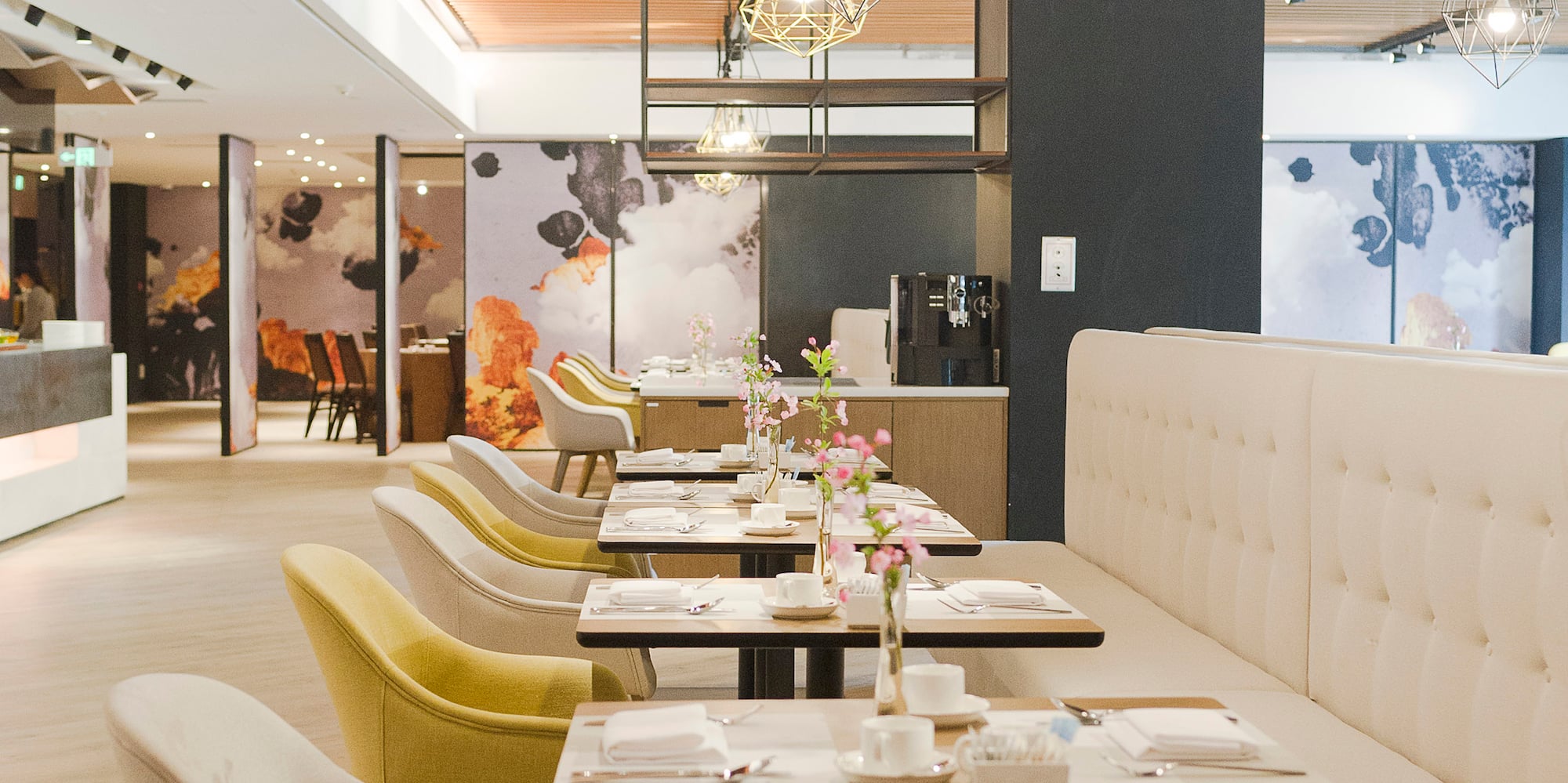 a restaurant with tables and chairs