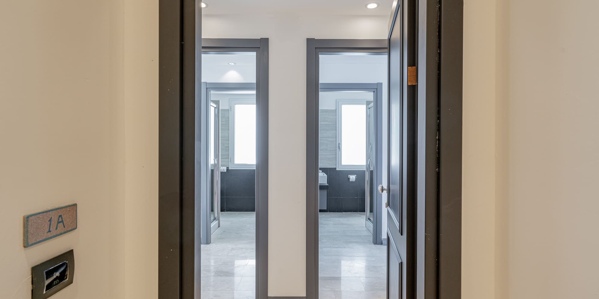 a hallway with two doors