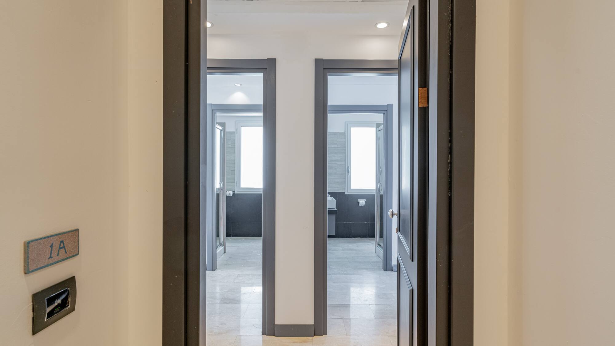 a hallway with two doors