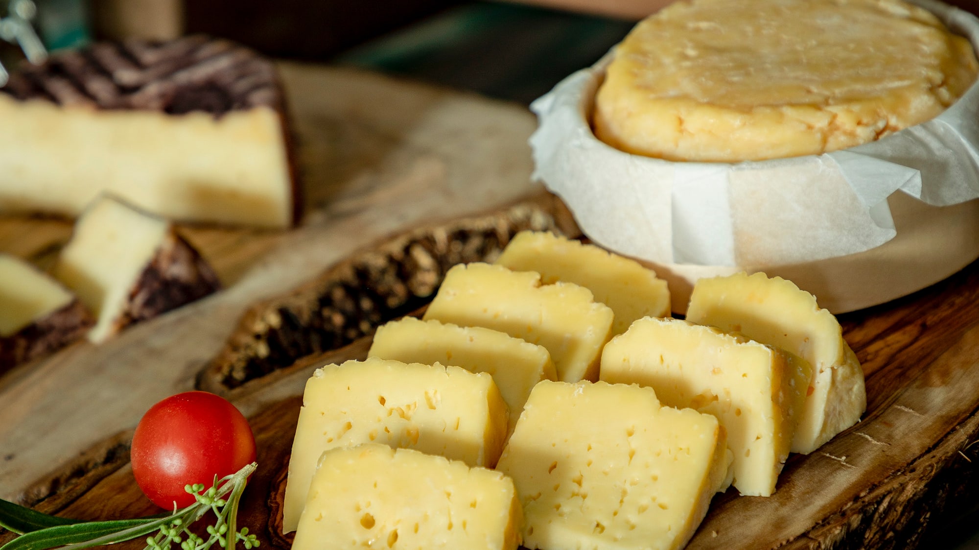 a plate of cheese on a table