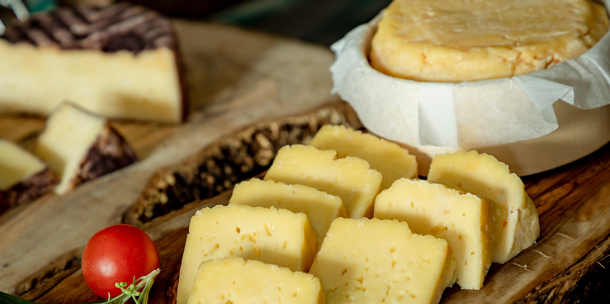 a plate of cheese on a table