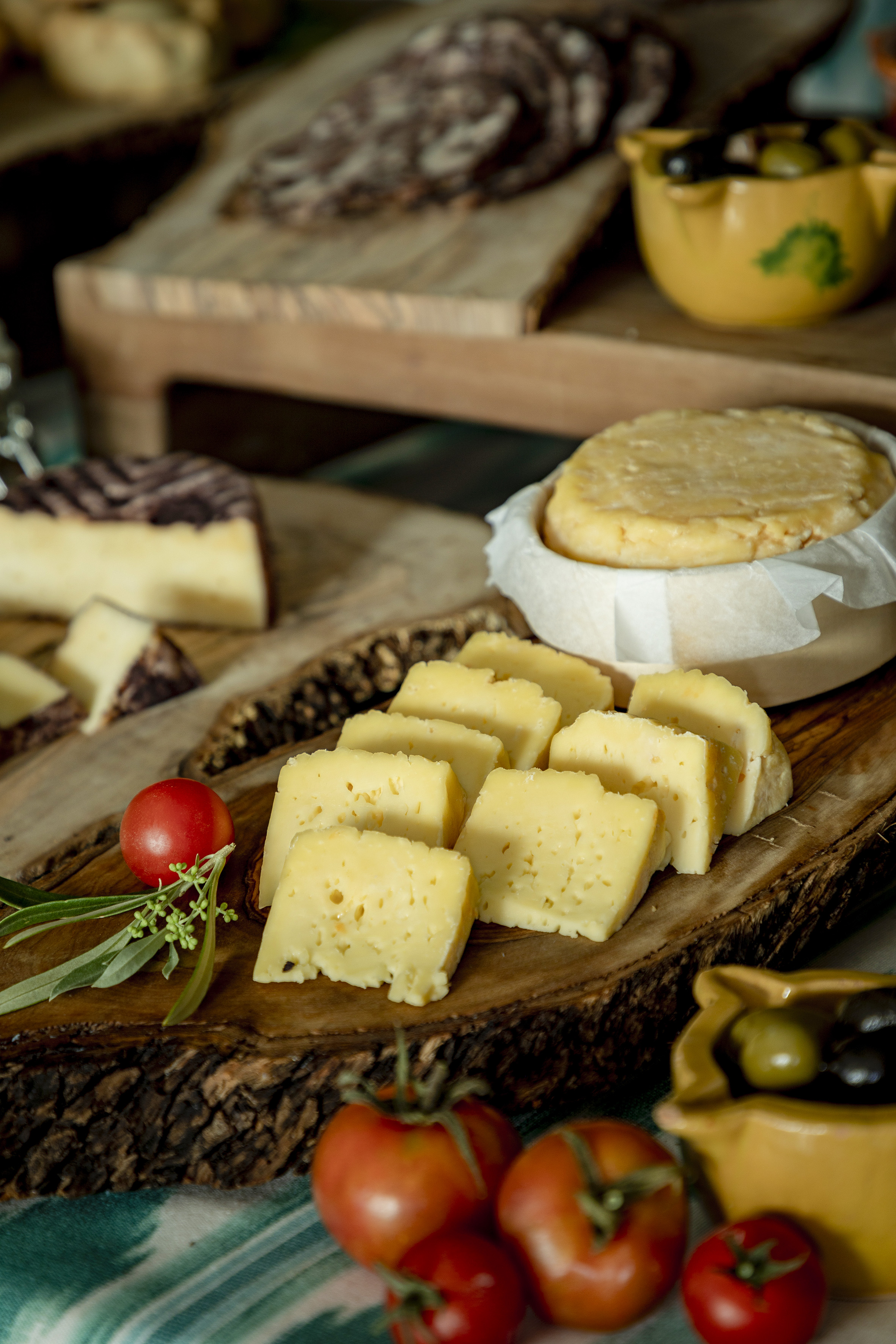 a plate of cheese on a table