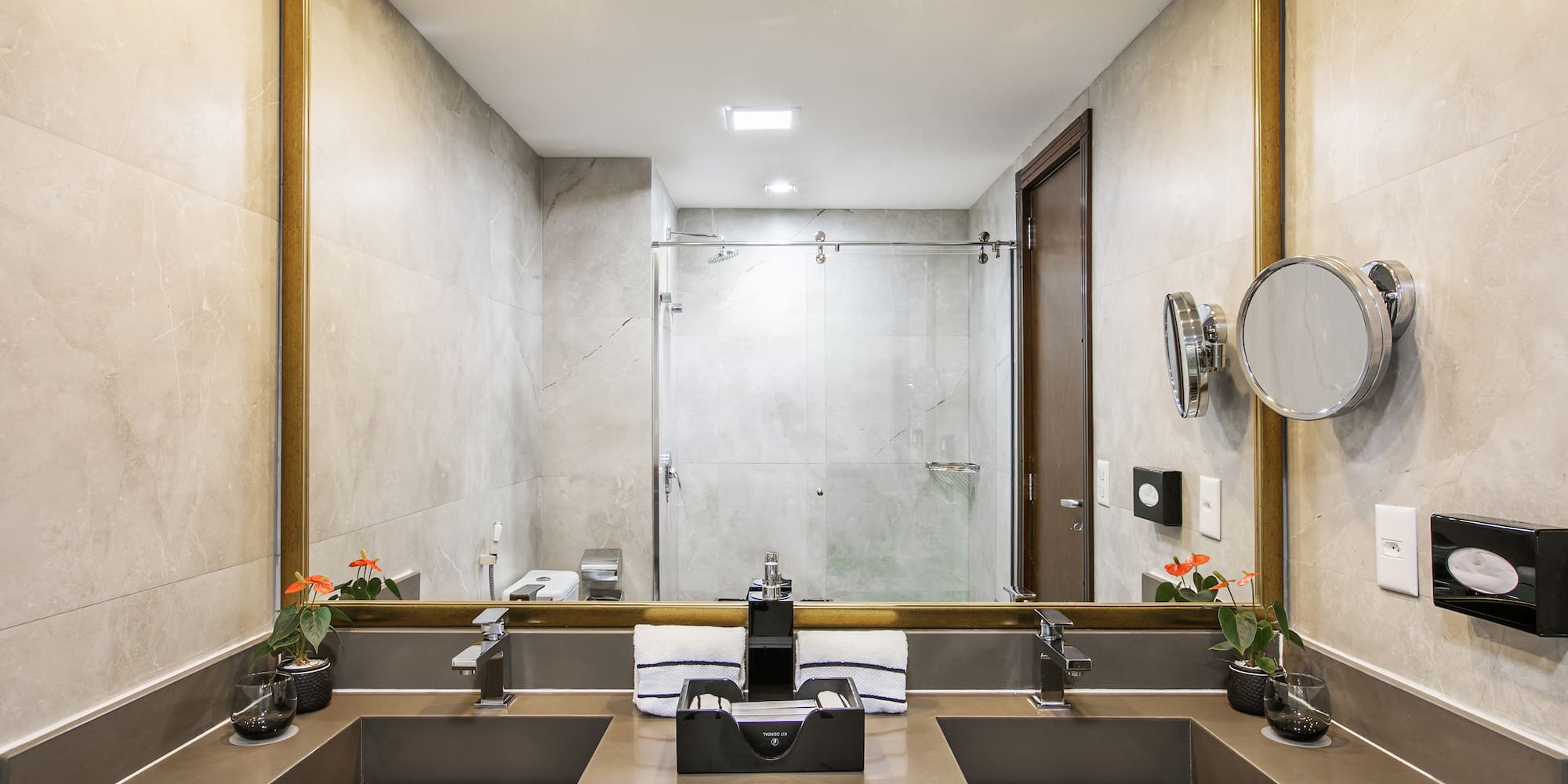 a bathroom with a large mirror