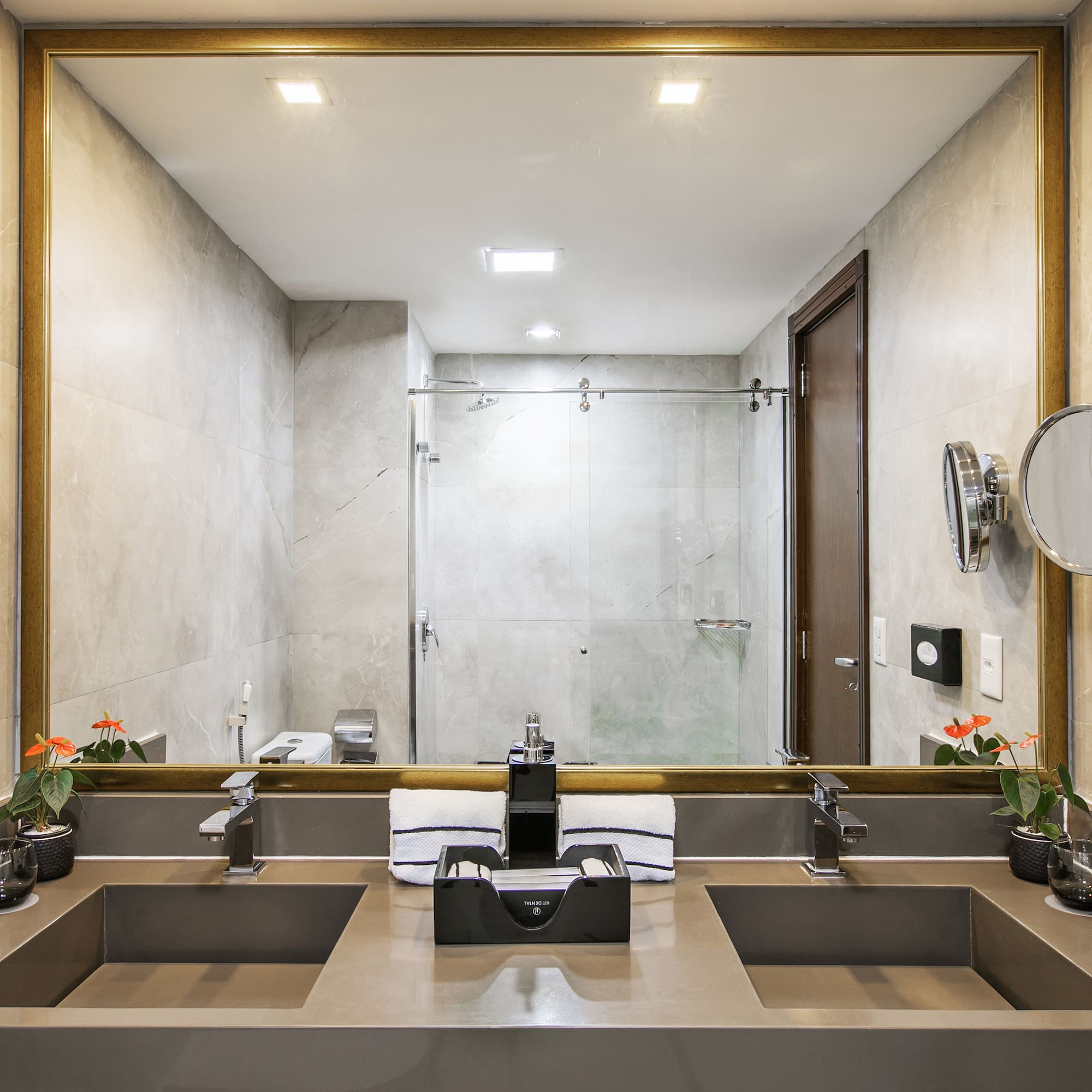 a bathroom with a large mirror