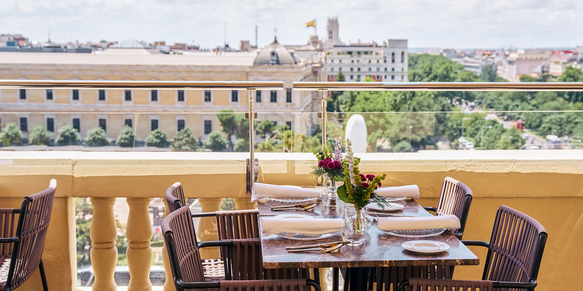 a table set up on a balcony