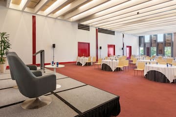 a room with tables and chairs