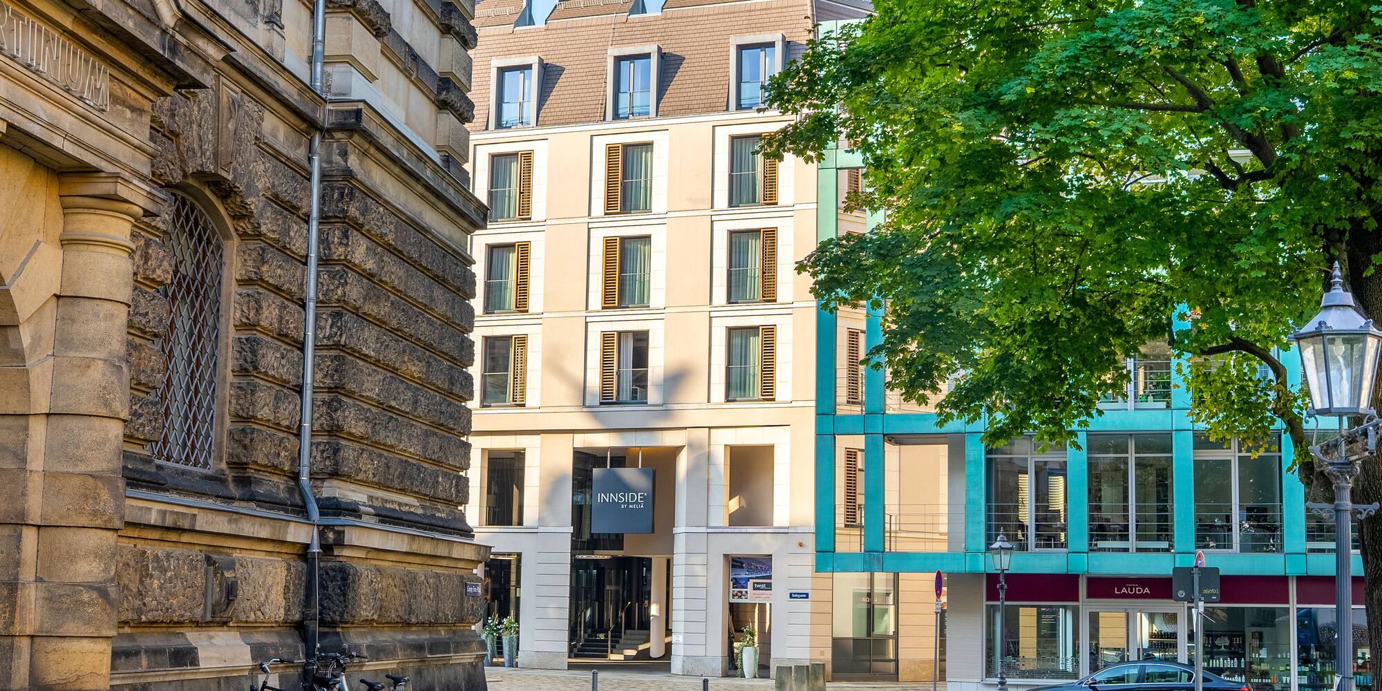 a group of bicycles parked in front of a building