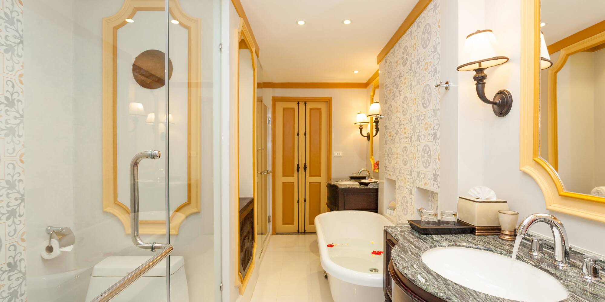 a bathroom with a tub and sink