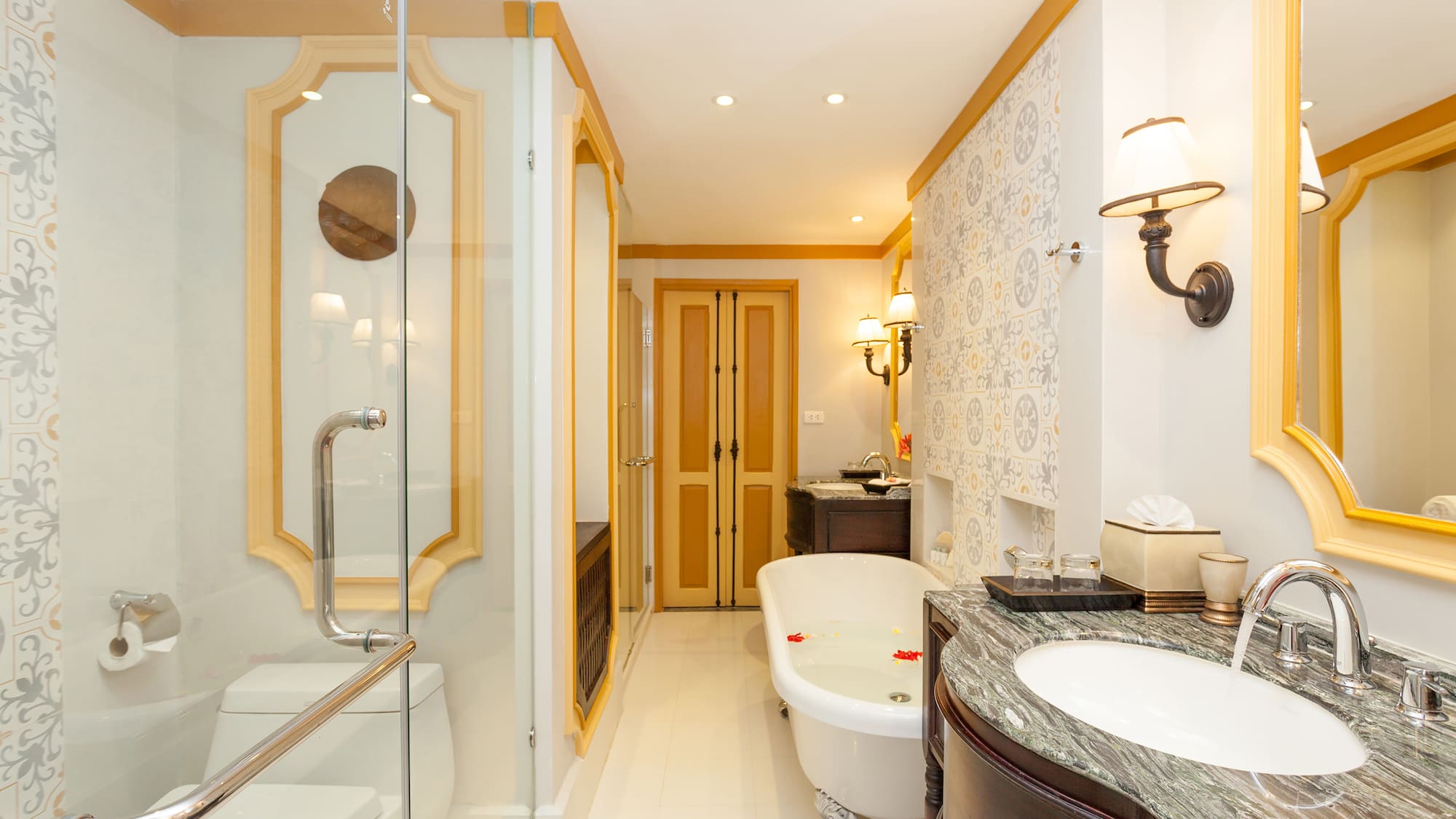 a bathroom with a tub and sink