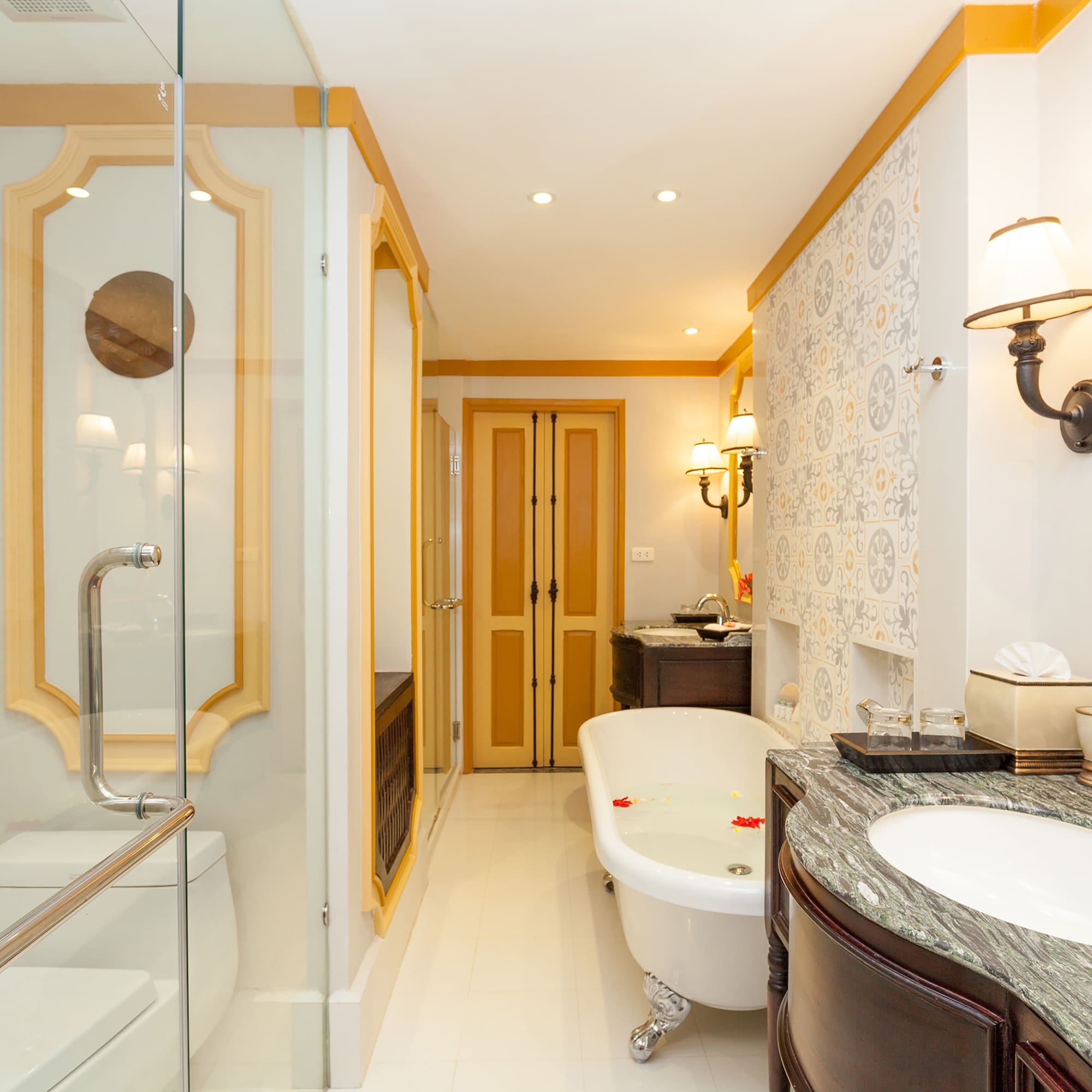 a bathroom with a tub and sink
