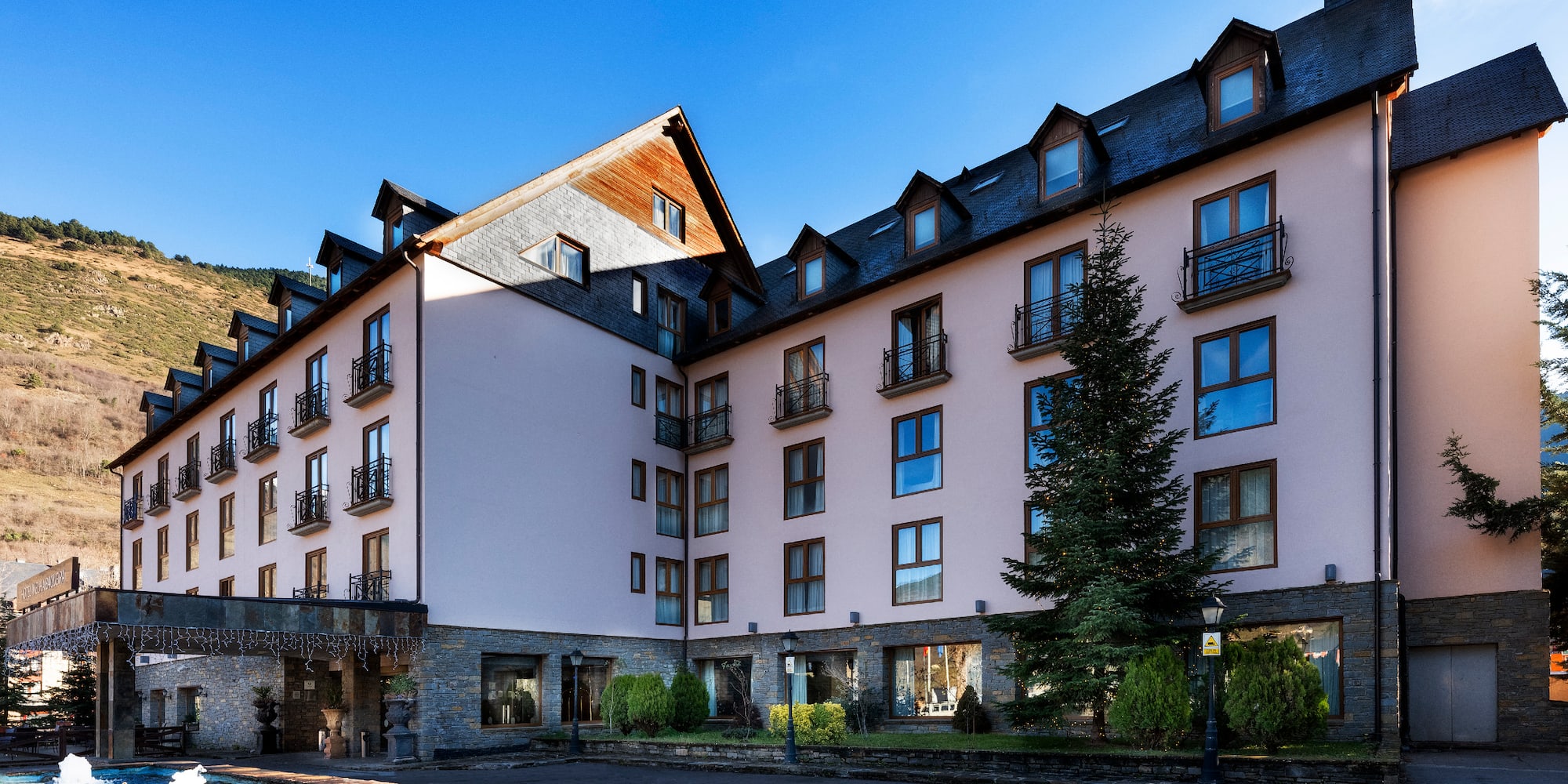 a building with a fountain in front of it