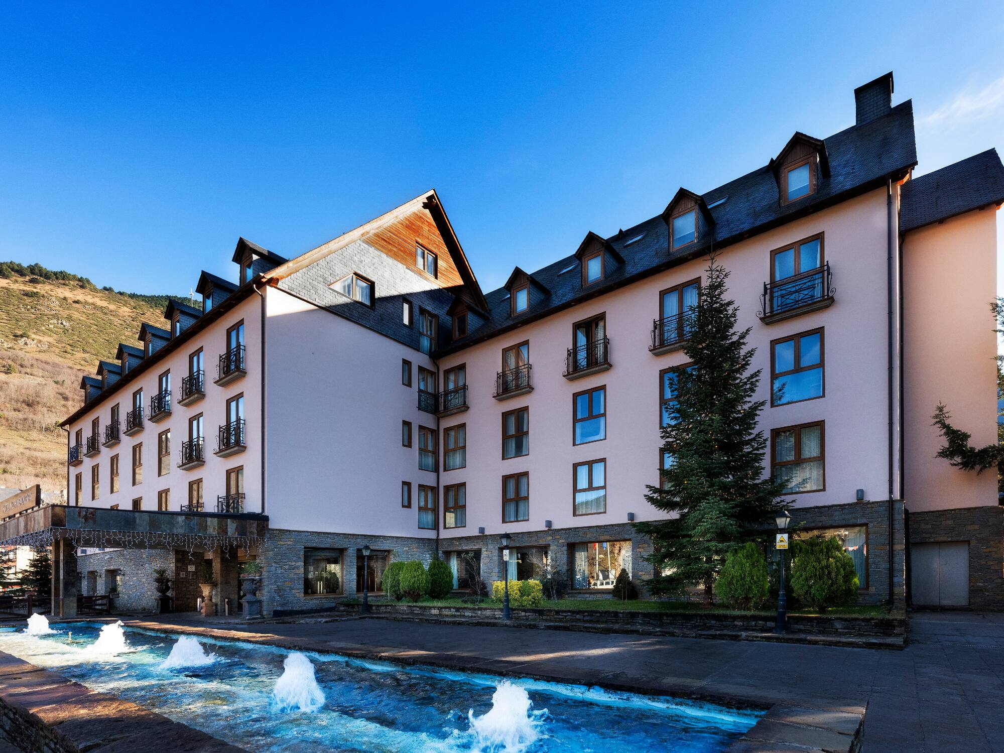 a building with a fountain in front of it