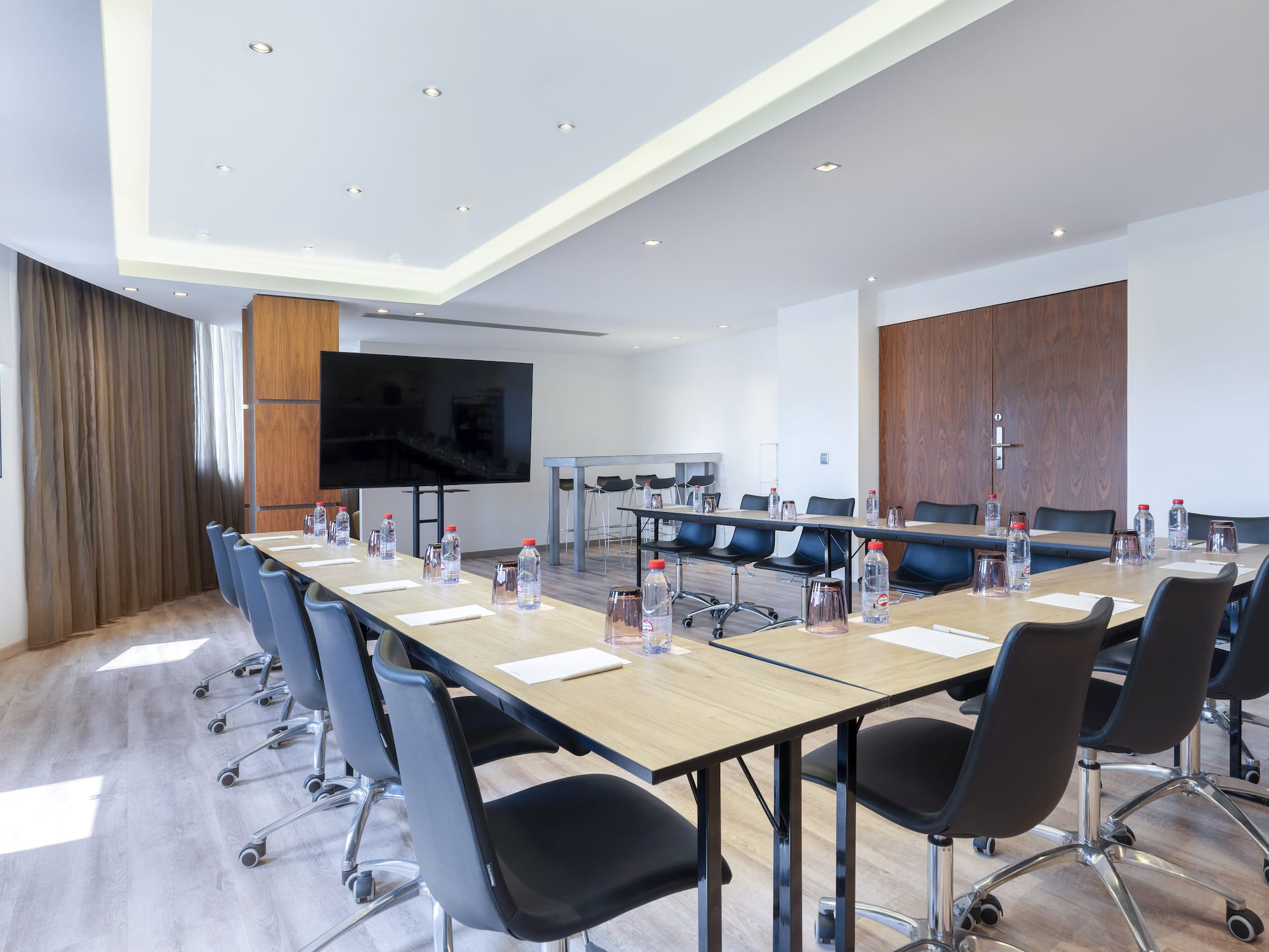 a room with a table and chairs