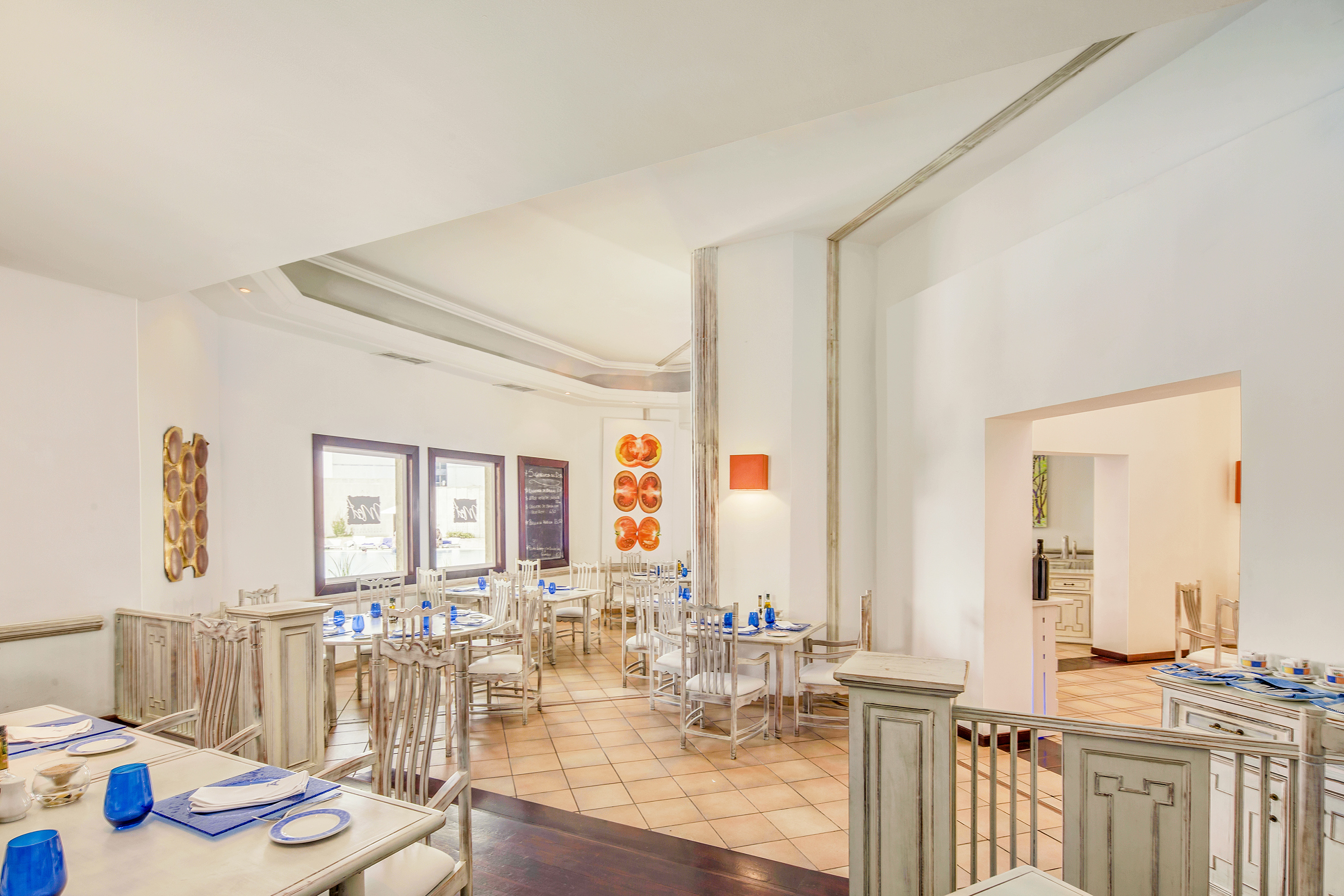 a room with tables and chairs