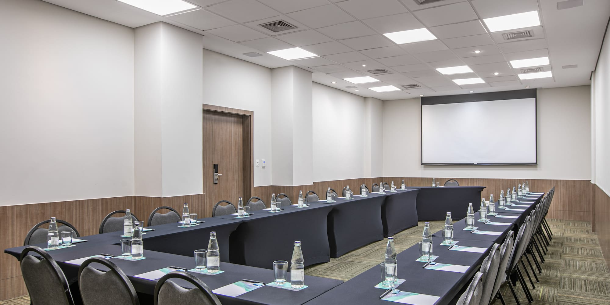 a room with tables and chairs