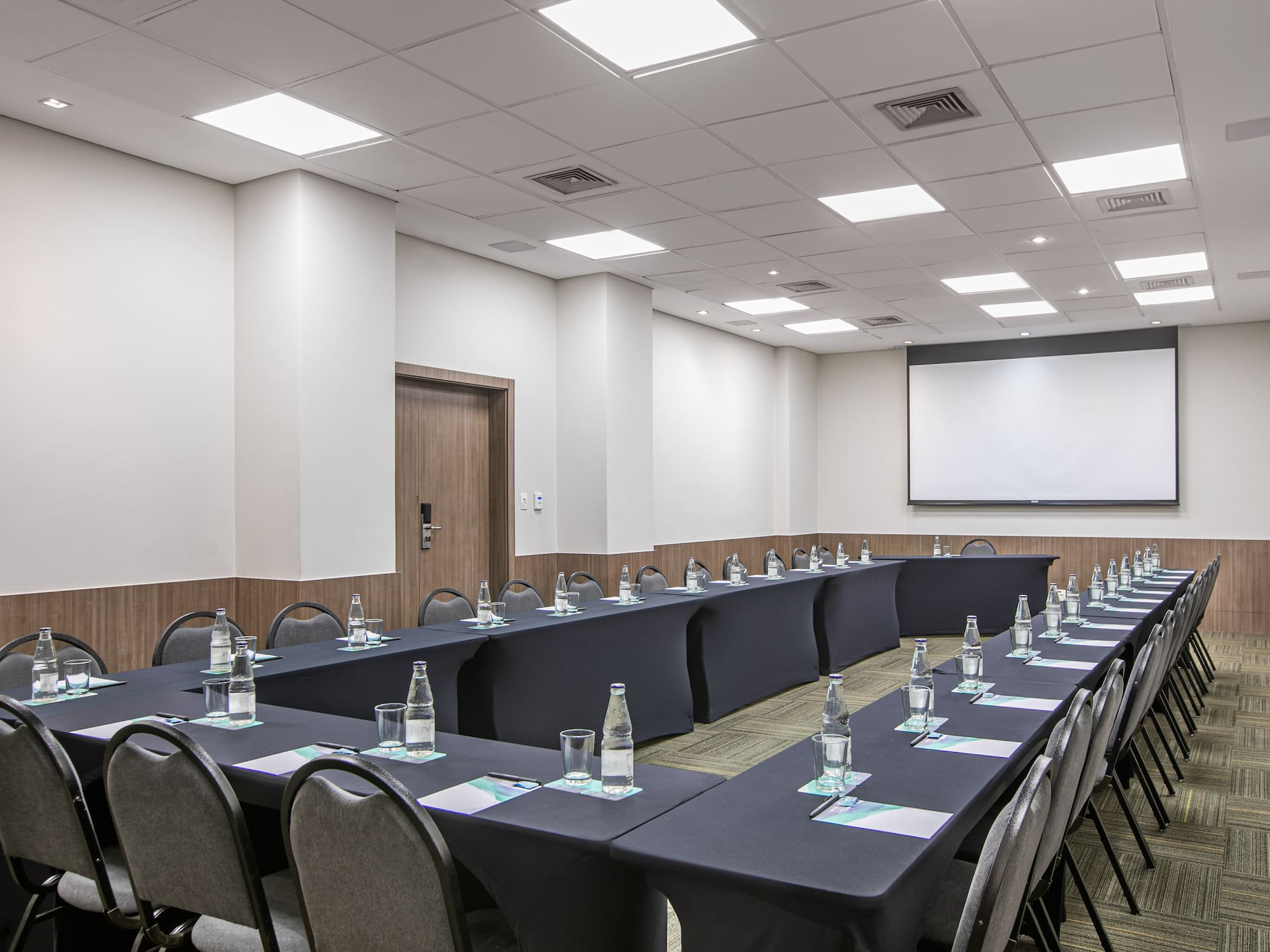 a room with tables and chairs