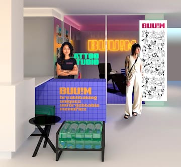 a woman standing in front of a glass wall