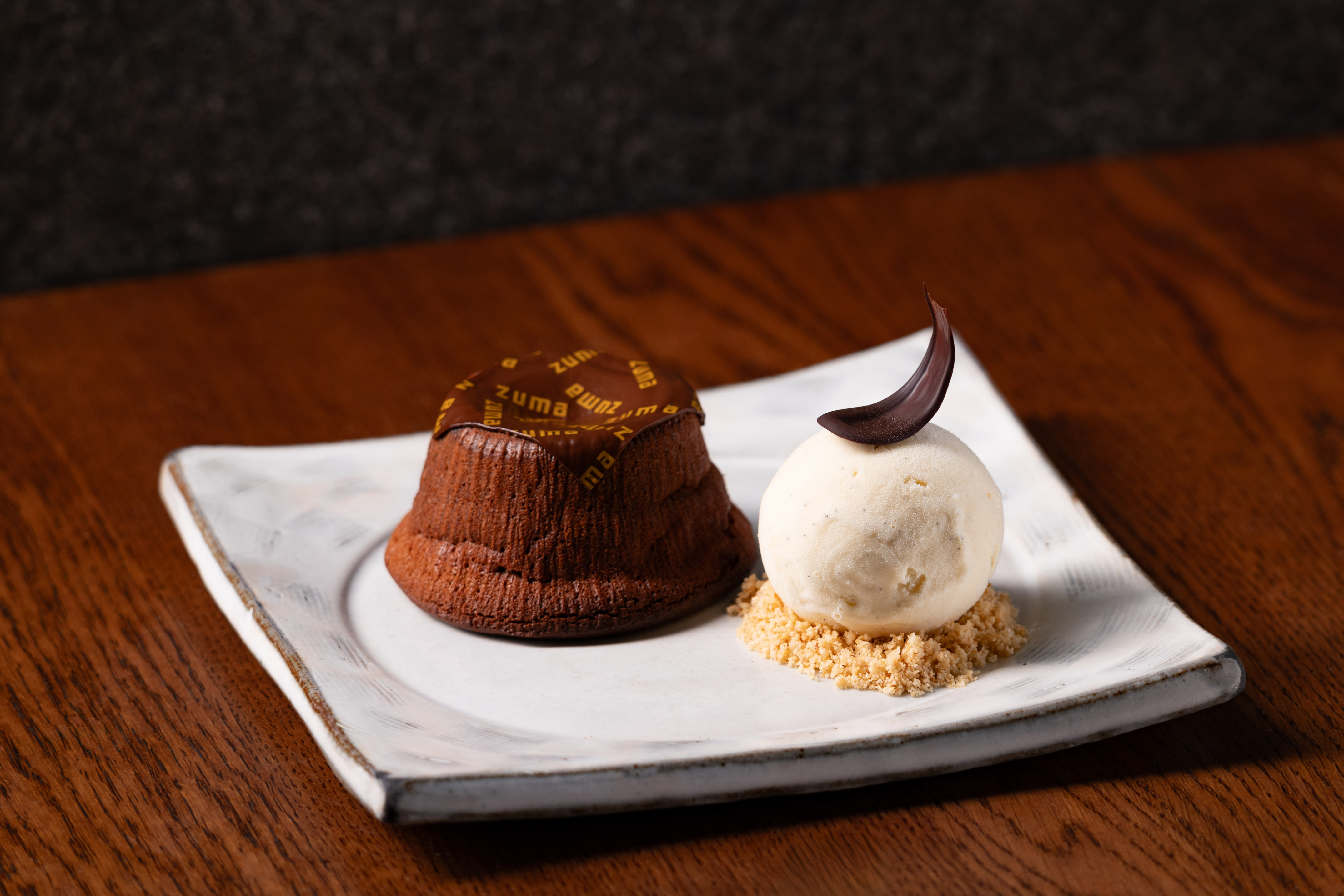 Zuma chocolate lava cake, vanilla ice cream, and chocolate garnish.