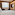 Contemporary hotel room: bed, window view, blue chairs, wooden table, and TV.