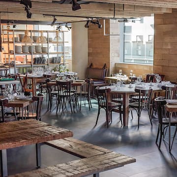 a room with tables and chairs