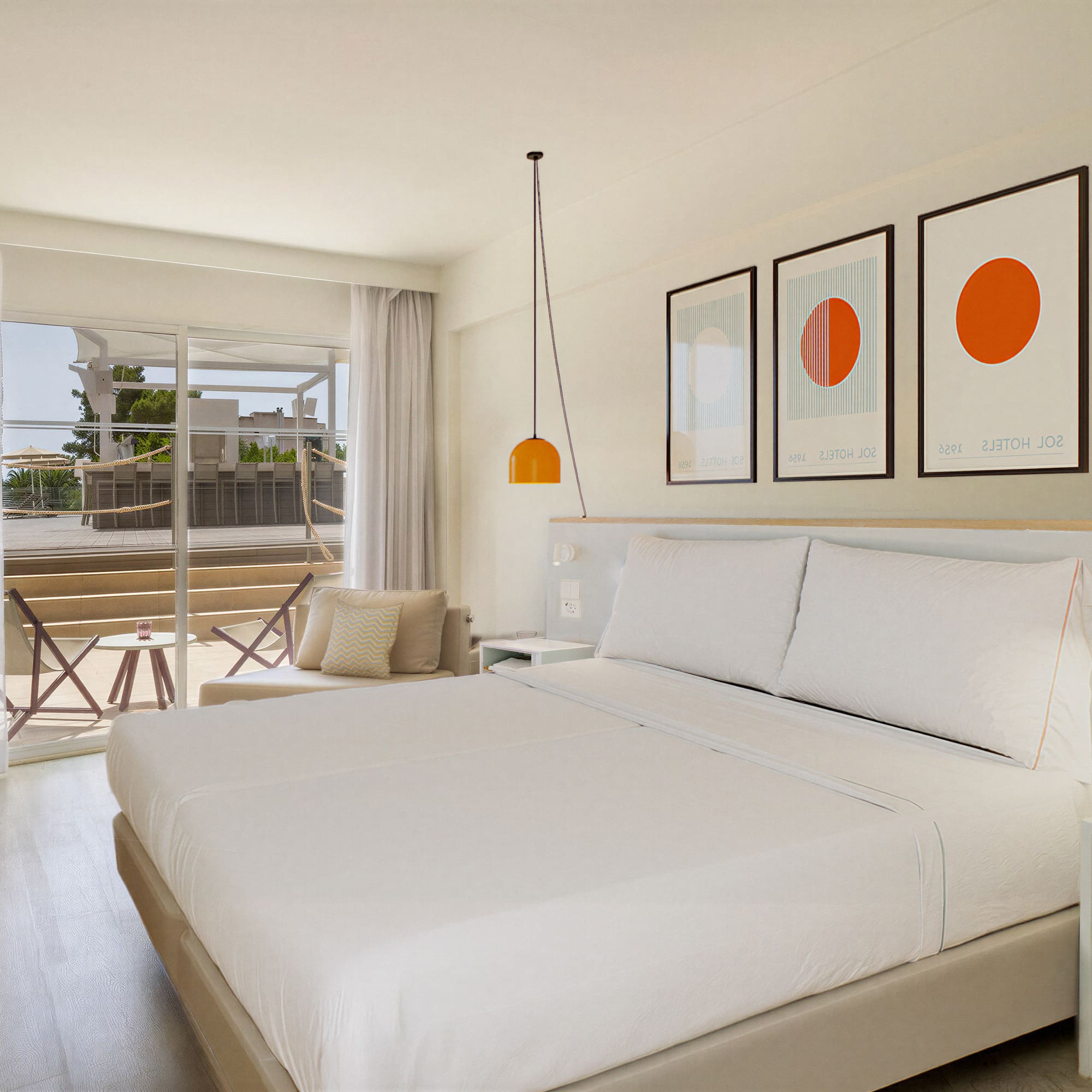 a bedroom with a bed and a glass door