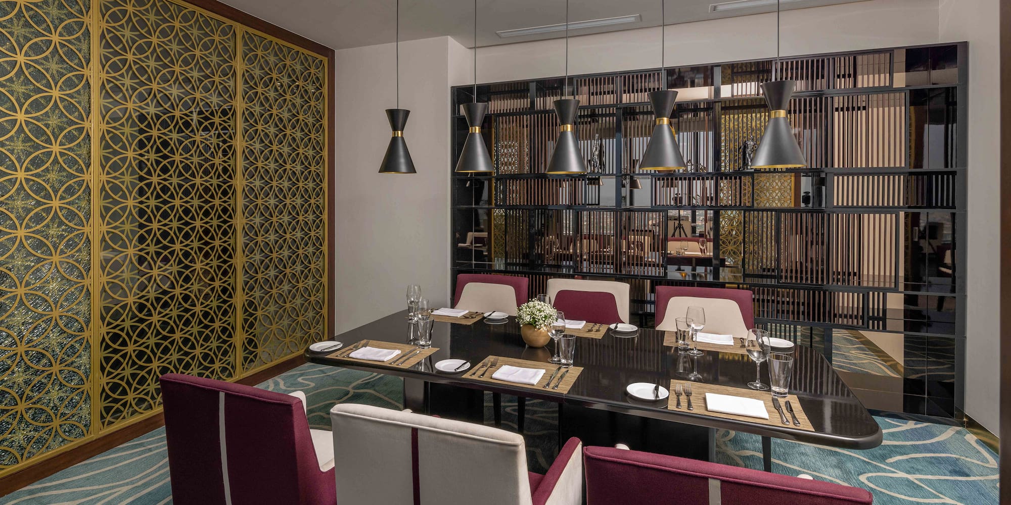 a room with a table and chairs